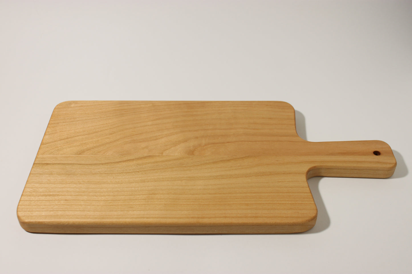 Schneidebrett 40cm x 20cm x 1.7cm mit Griff Kirschbaum