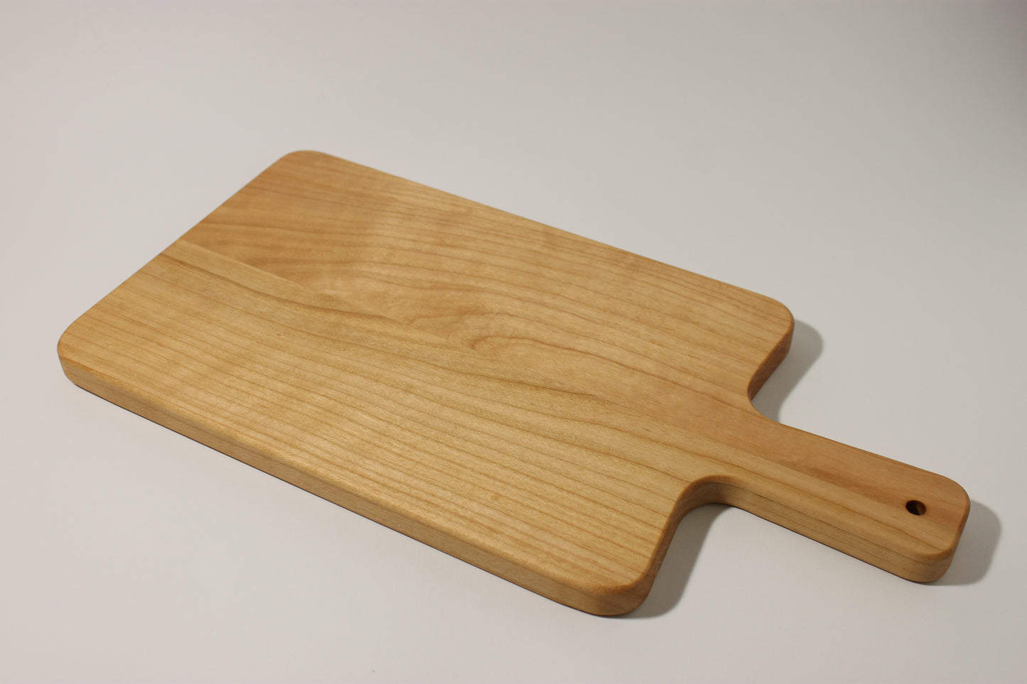 Schneidebrett 40cm x 20cm x 1.7cm mit Griff Kirschbaum
